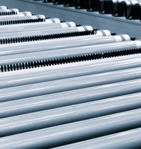 Rows of Engineered Components Company industrial conveyor rollers.